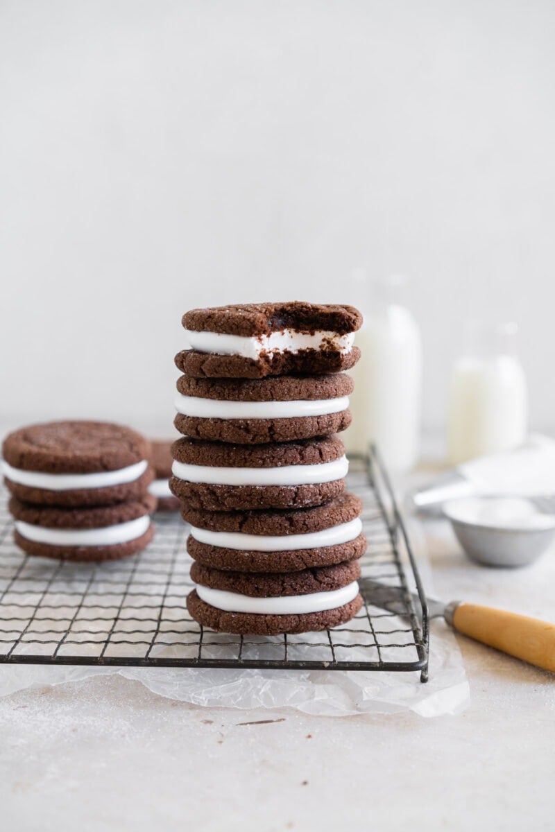 Stack of hot chocolate sugar cookies, with bite taken out of the top one.