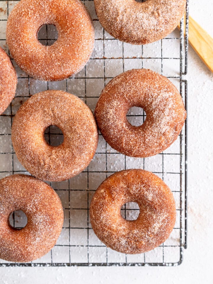 top down shot of doughnuts on wire rack