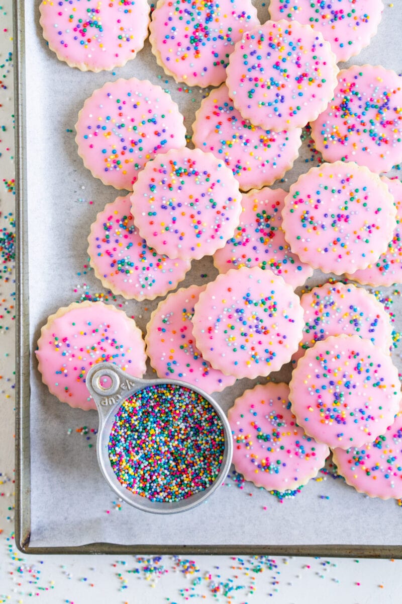 corner shot of hundreds and thousands cookies on sheet pan