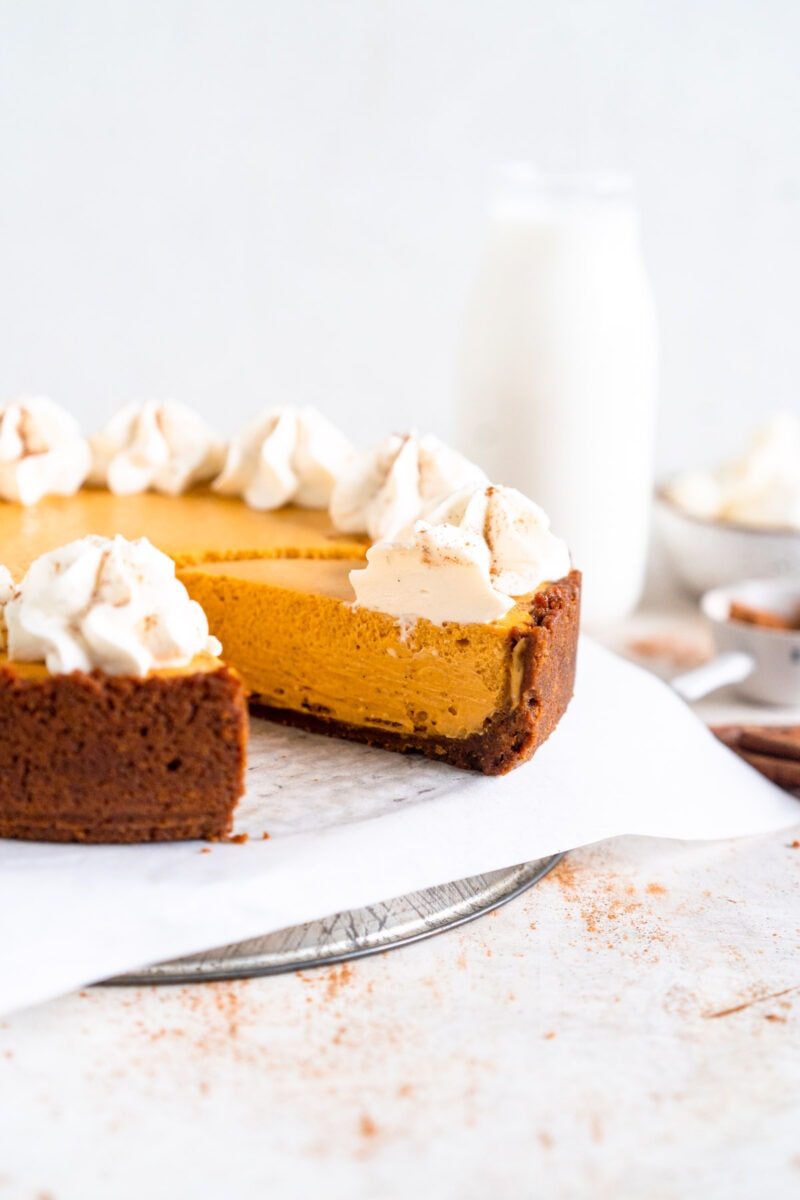 side shot of piece of pumpkin cheesecake