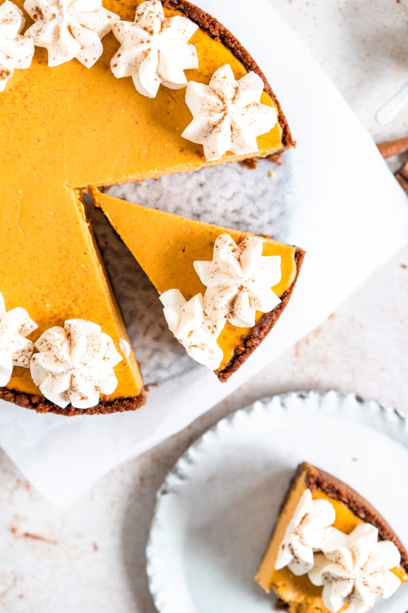Top down shot of slice of pumpkin cheesecake