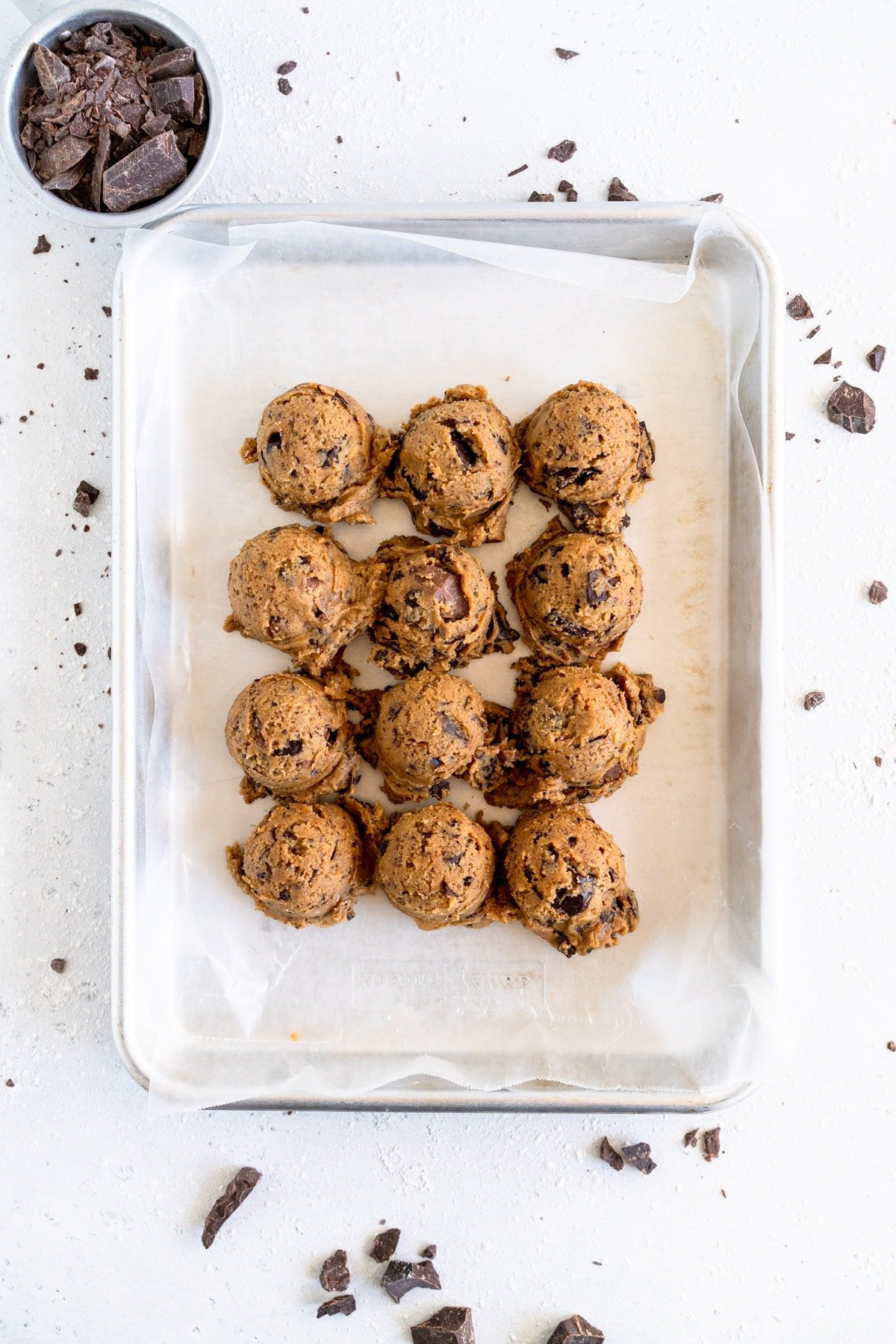 shot of 12 cookie balls on sheet pan
