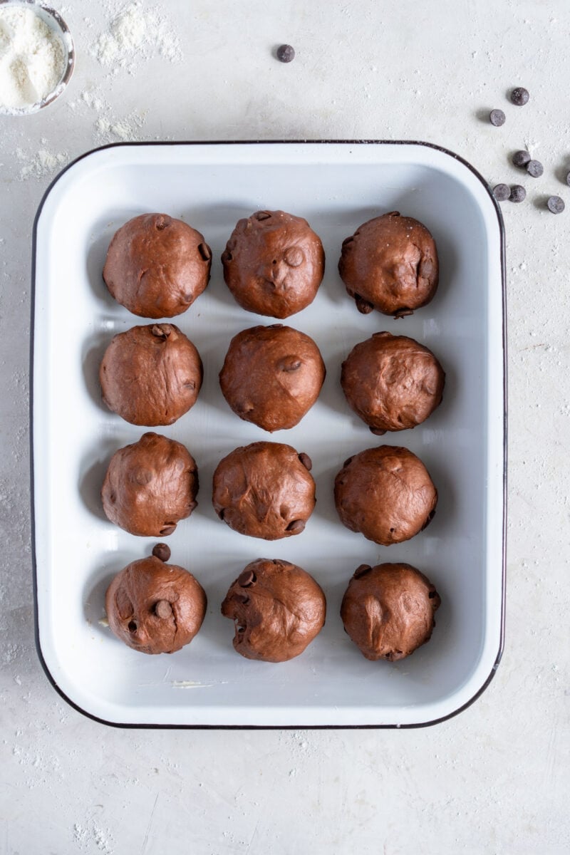 chocolate cardamom hot cross buns ready to rise