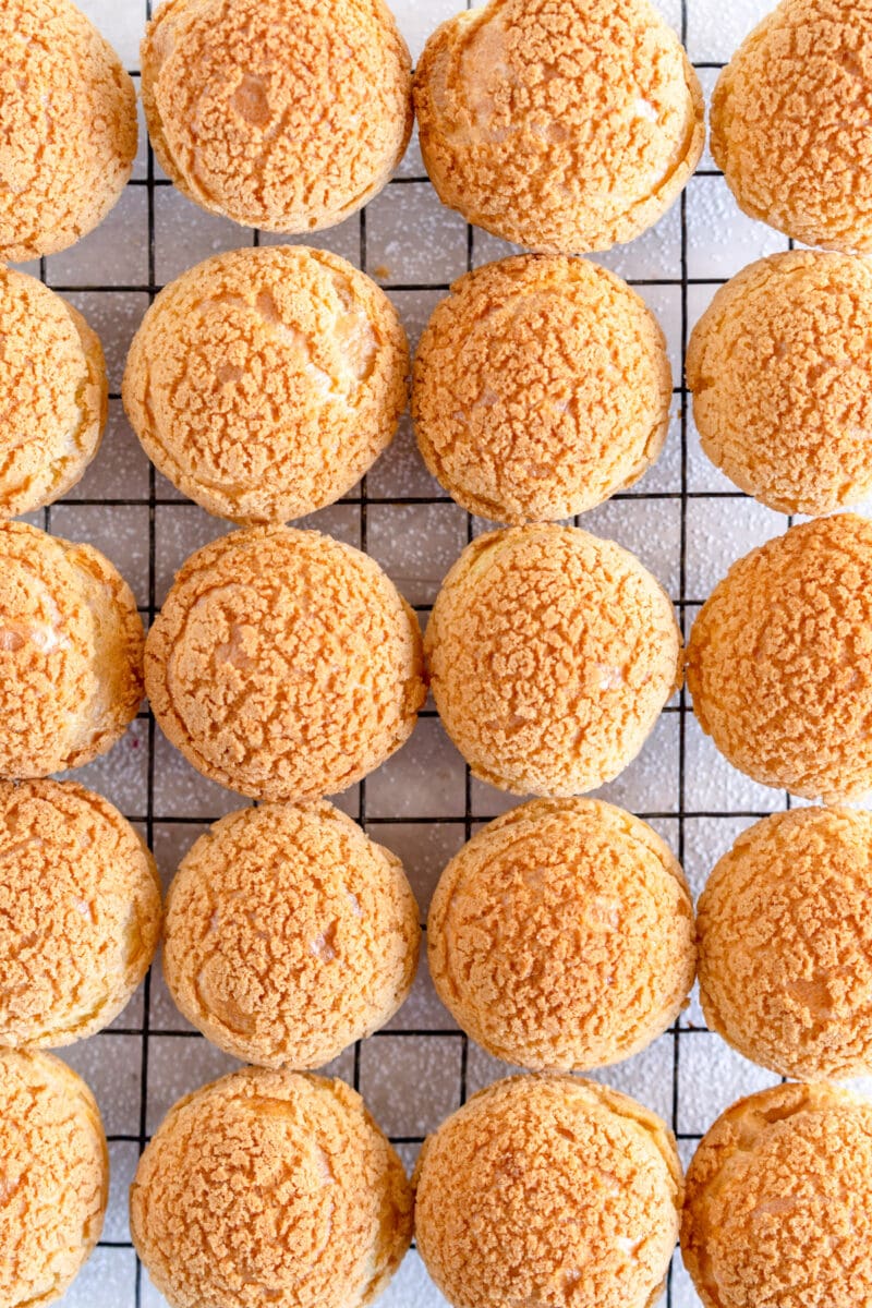 cream puff shells on wire rack