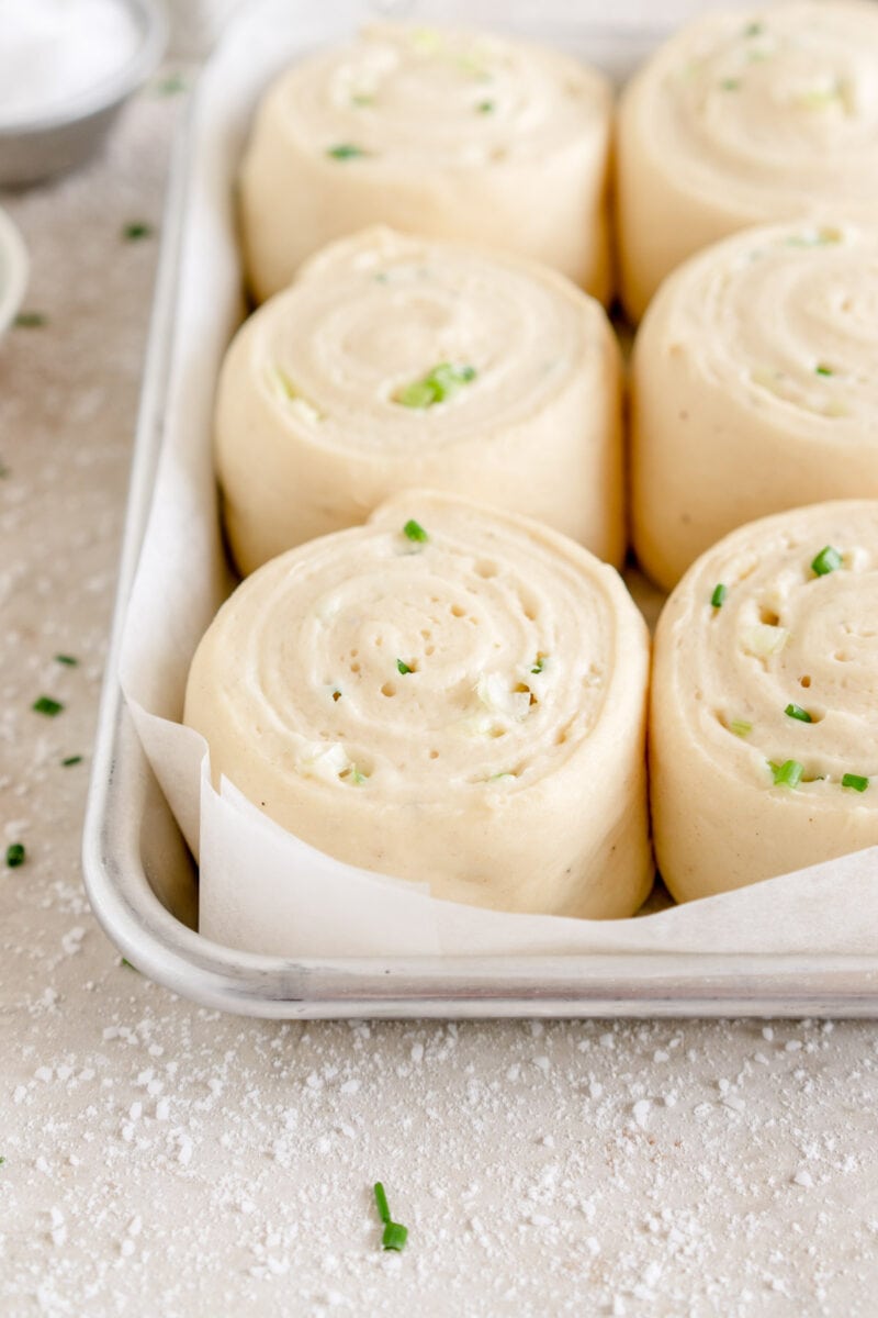 side on angle shot of cheese buns with chives
