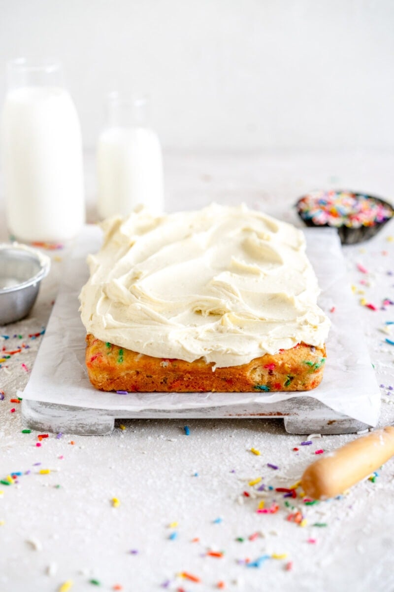 side on shot of frosted funfetti mini cake