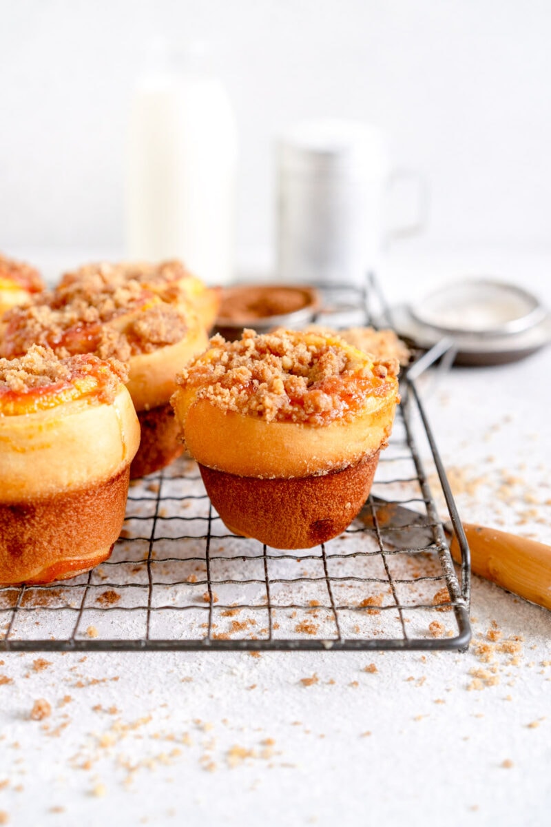 side shot of rhubarb bun on wire rack