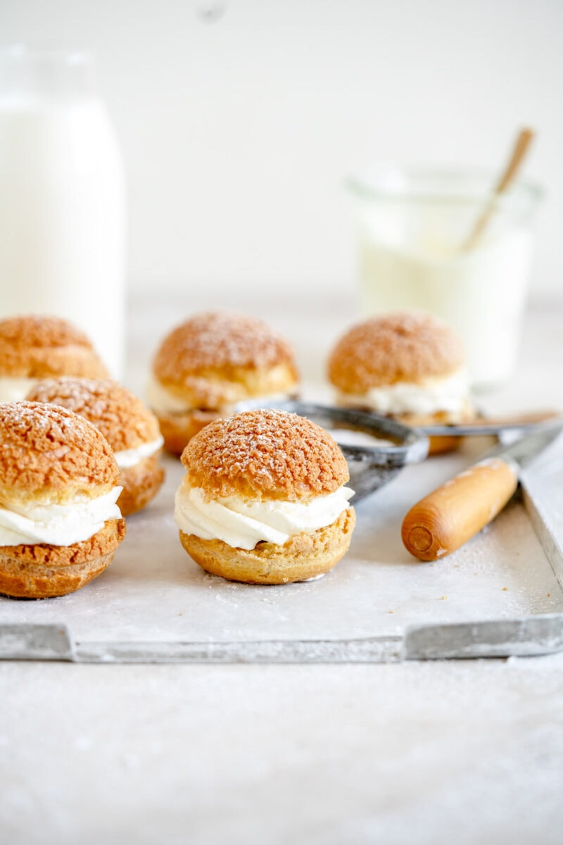 side shot of cream puff filled with whipped cream