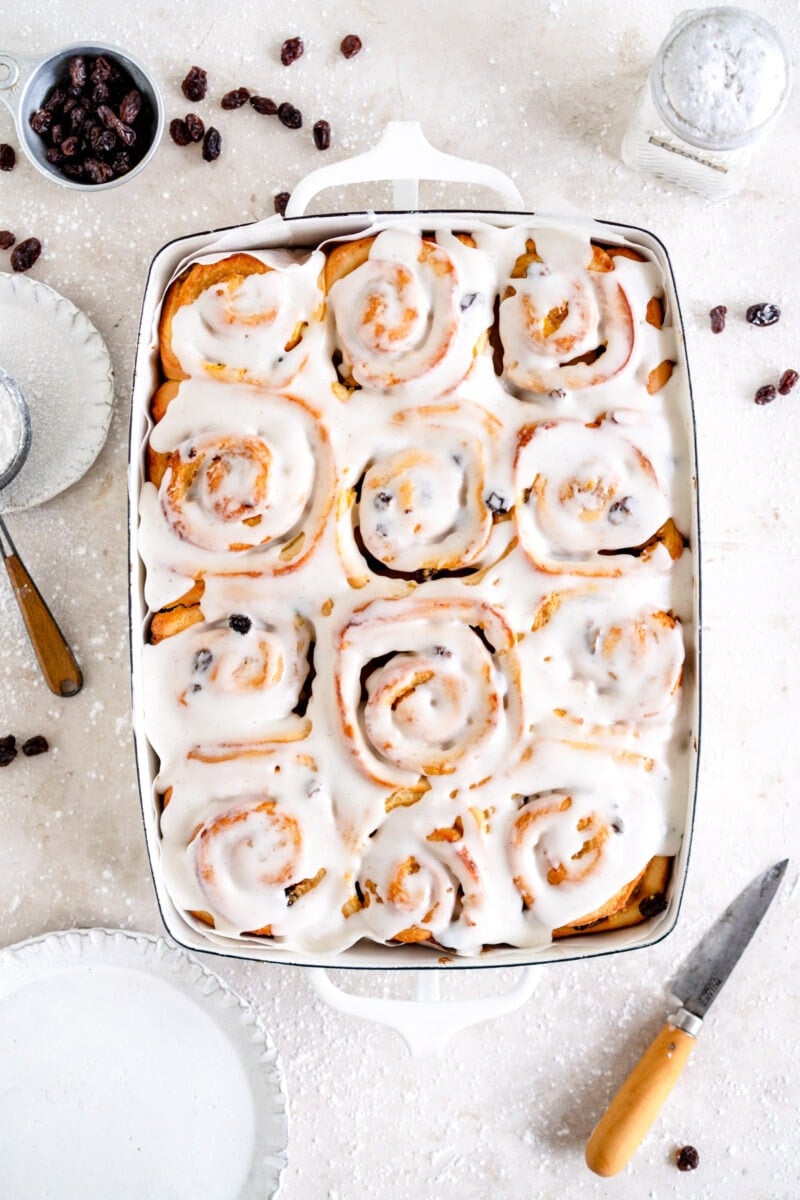 pan of iced chelsea buns