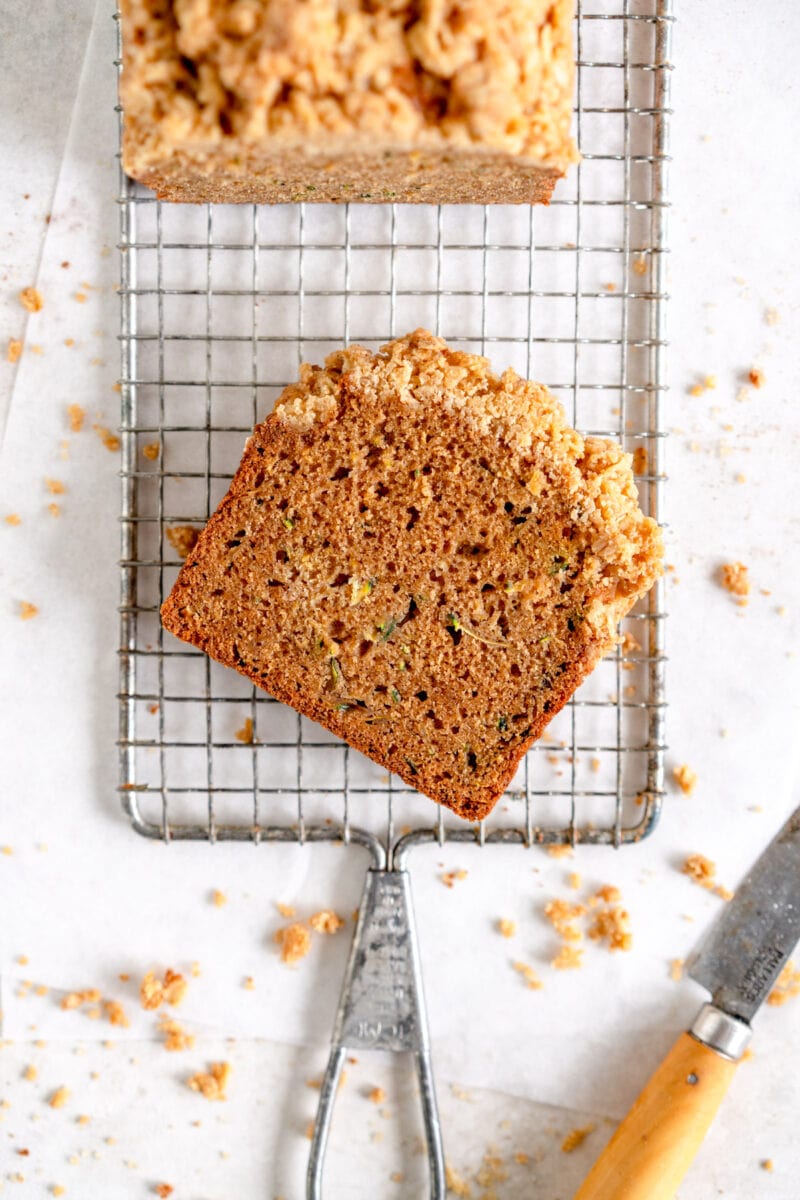 slice of zucchini bread on rack