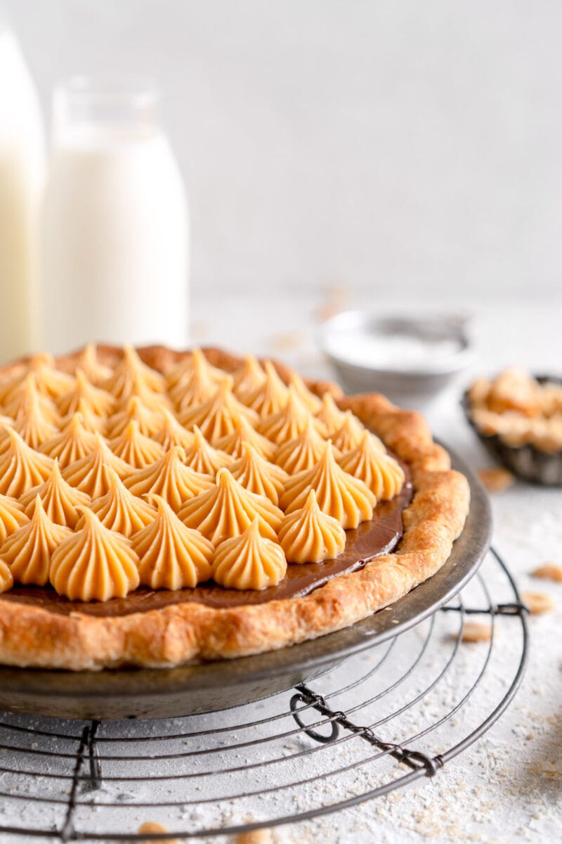 side shot peanut butter whipped cream on chocolate pie