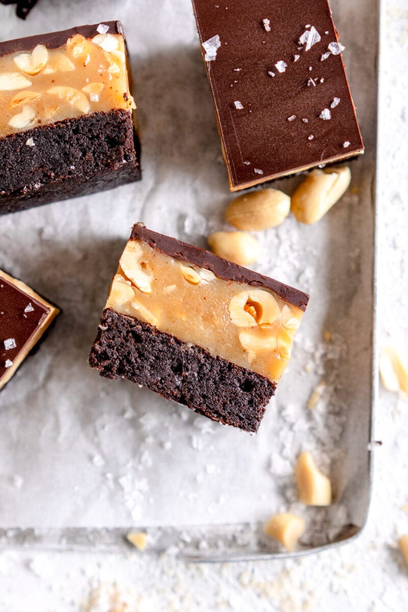 close up peanut brownie caramel slice