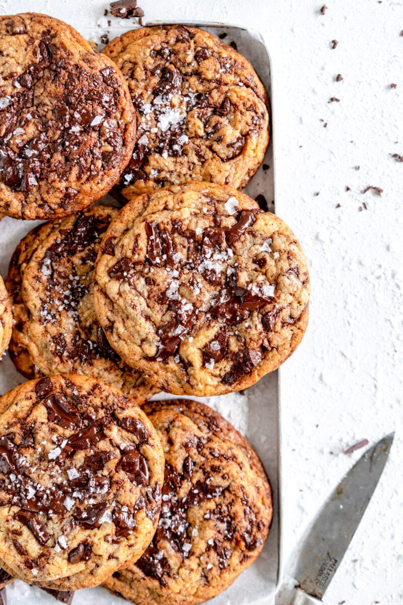 corner of stacked chocolate chip cookies