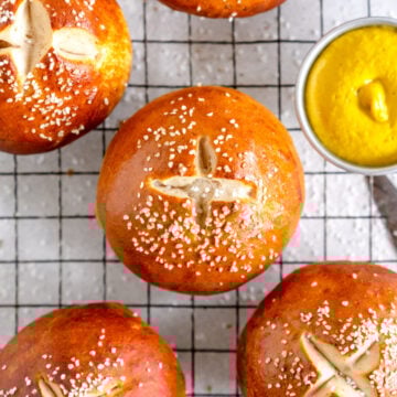 baked bread roll with ketchup and mustard
