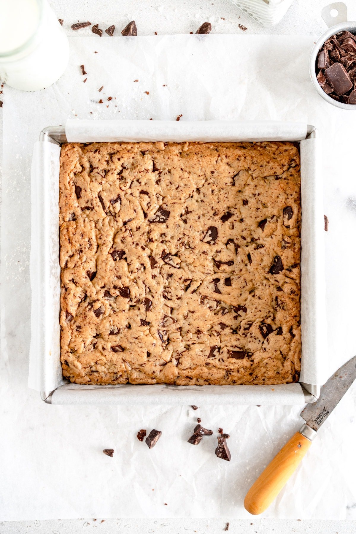 baked cookie bars in pan on paper