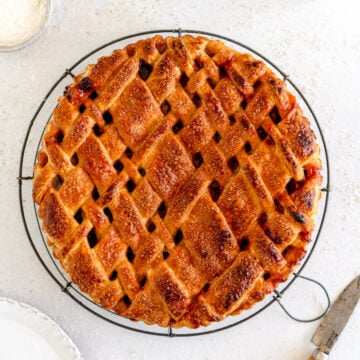 baked rhubarb pie on wire rack