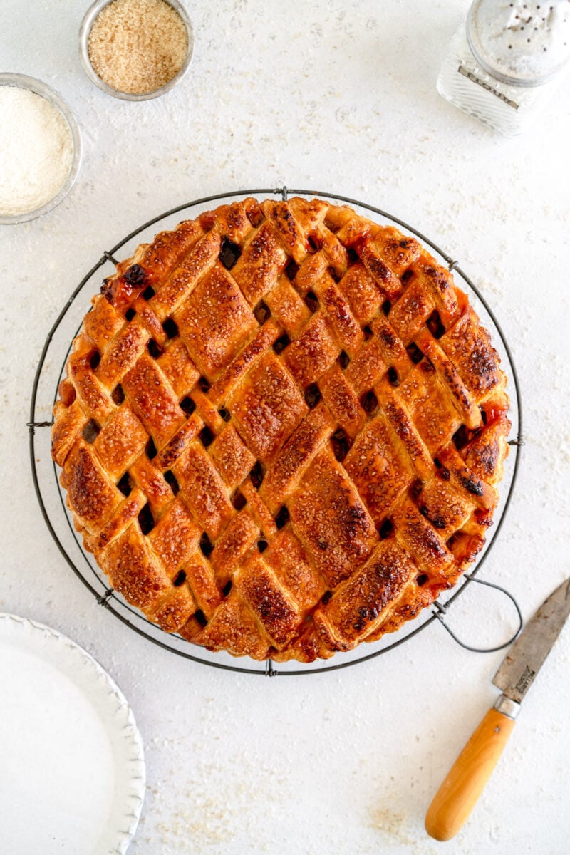 baked rhubarb pie on wire rack