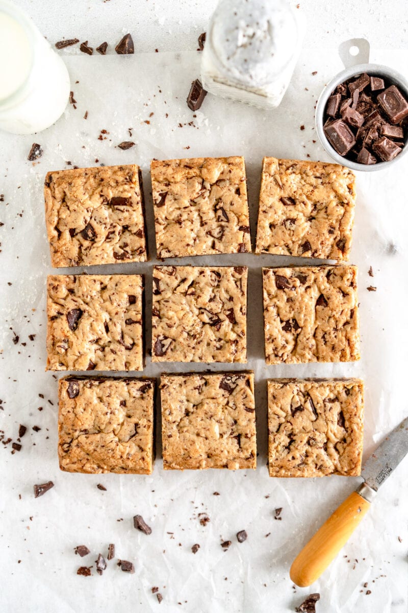 squares of cookie bars on wax paper