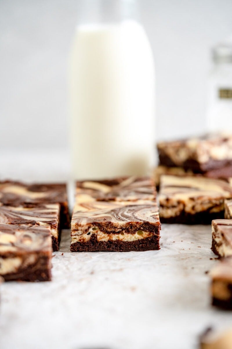 brownie with bottle of milk in the background