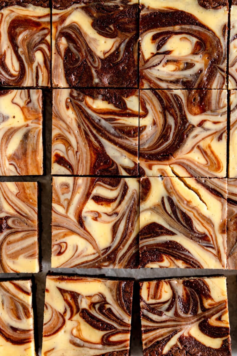 close up of cut cheesecake brownies