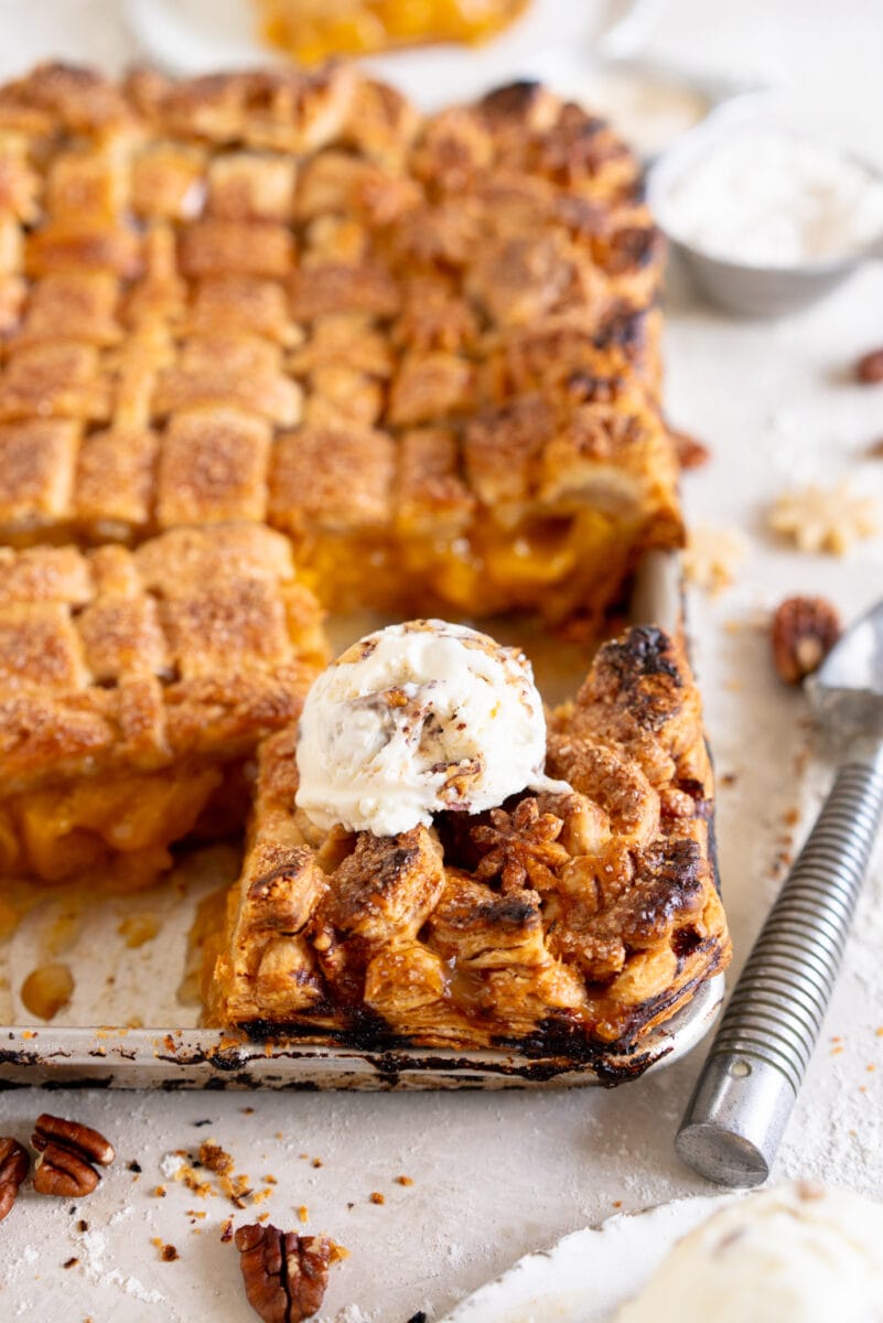Peach pie with ice cream scooped on top