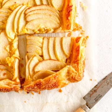 corner shot of apple galette with slice taken out