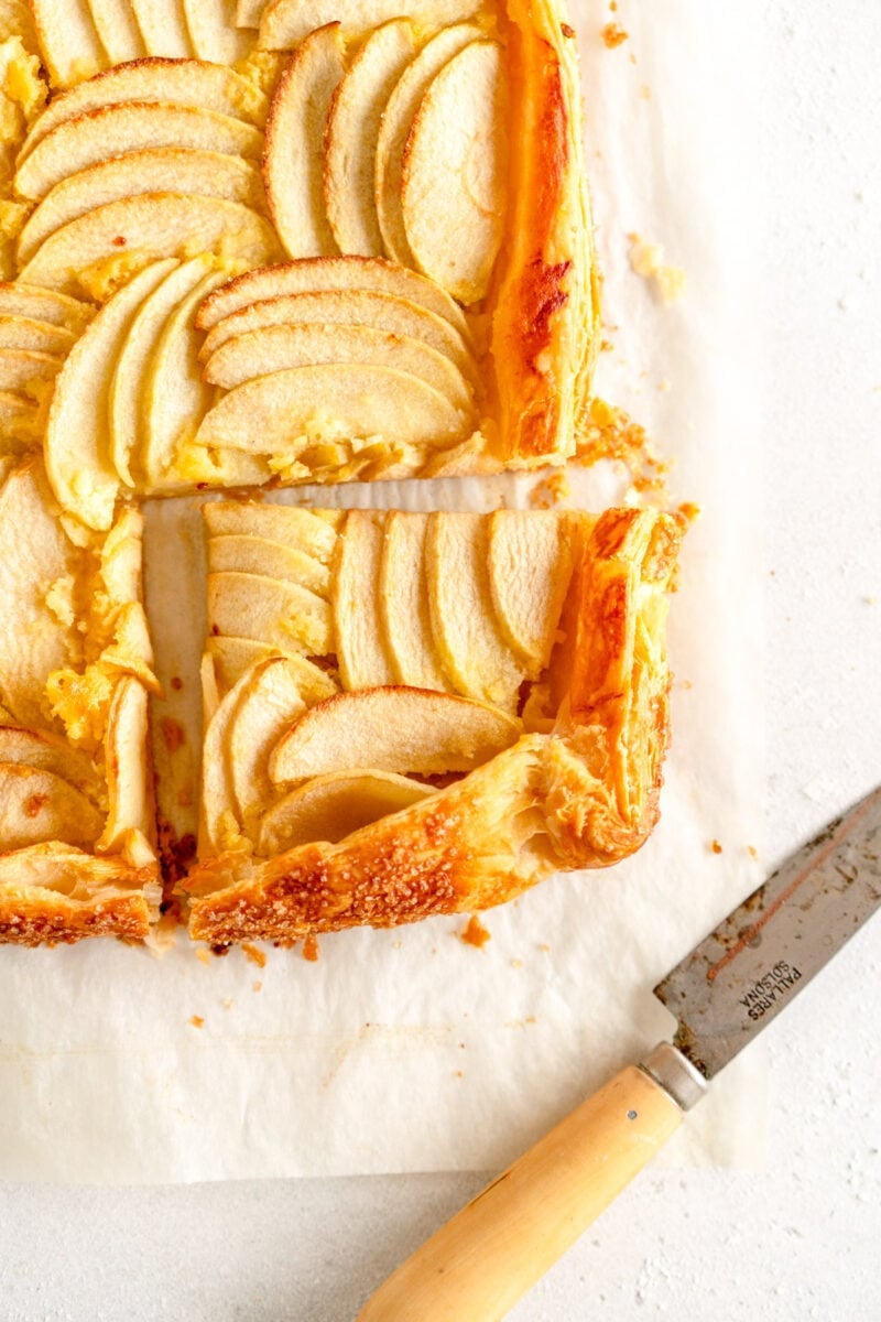 corner shot of apple galette with slice taken out