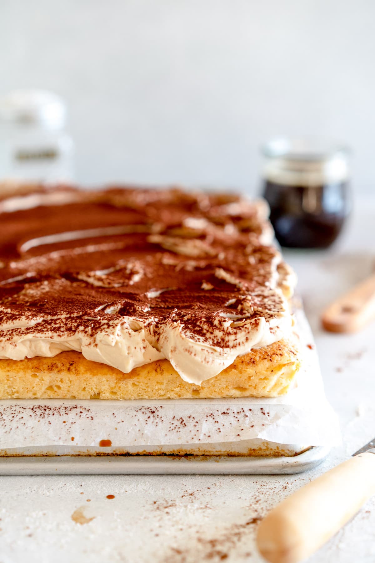 cake with frosting and cocoa