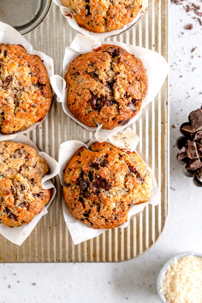 top down image of baked banana chocolate chip muffins