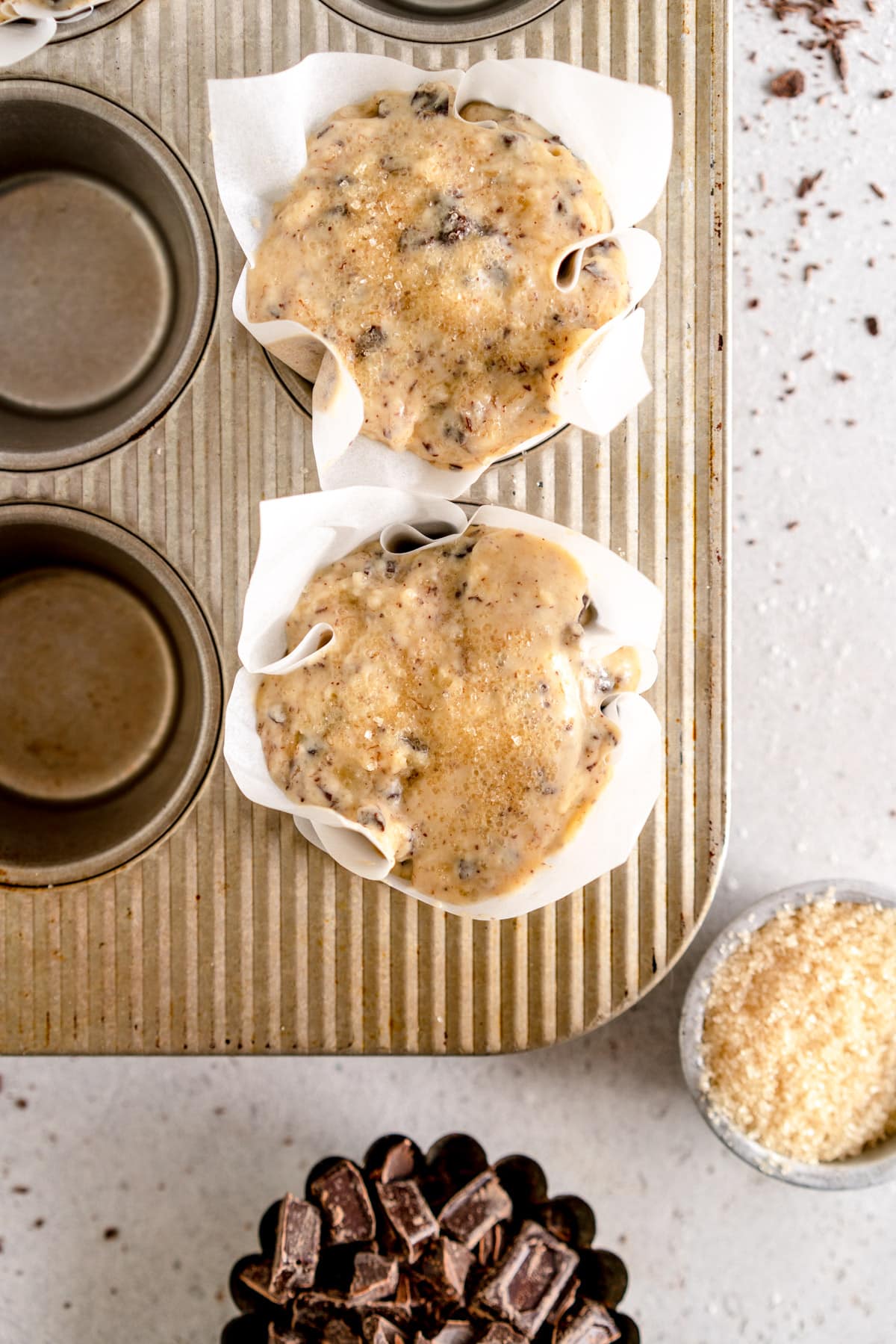 chocolate chip muffin batter in muffin pan