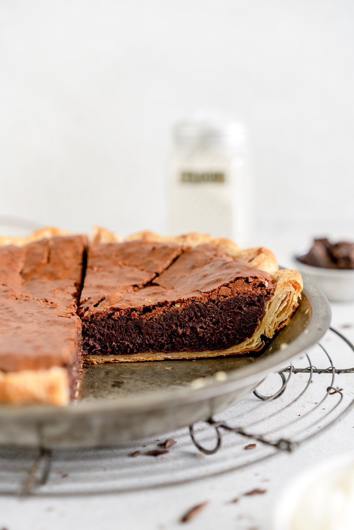 side shot of baked brownie pie in pan