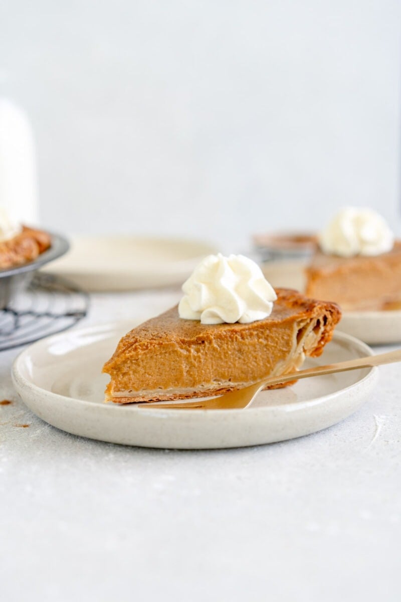 slice of pumpkin pie on a plate