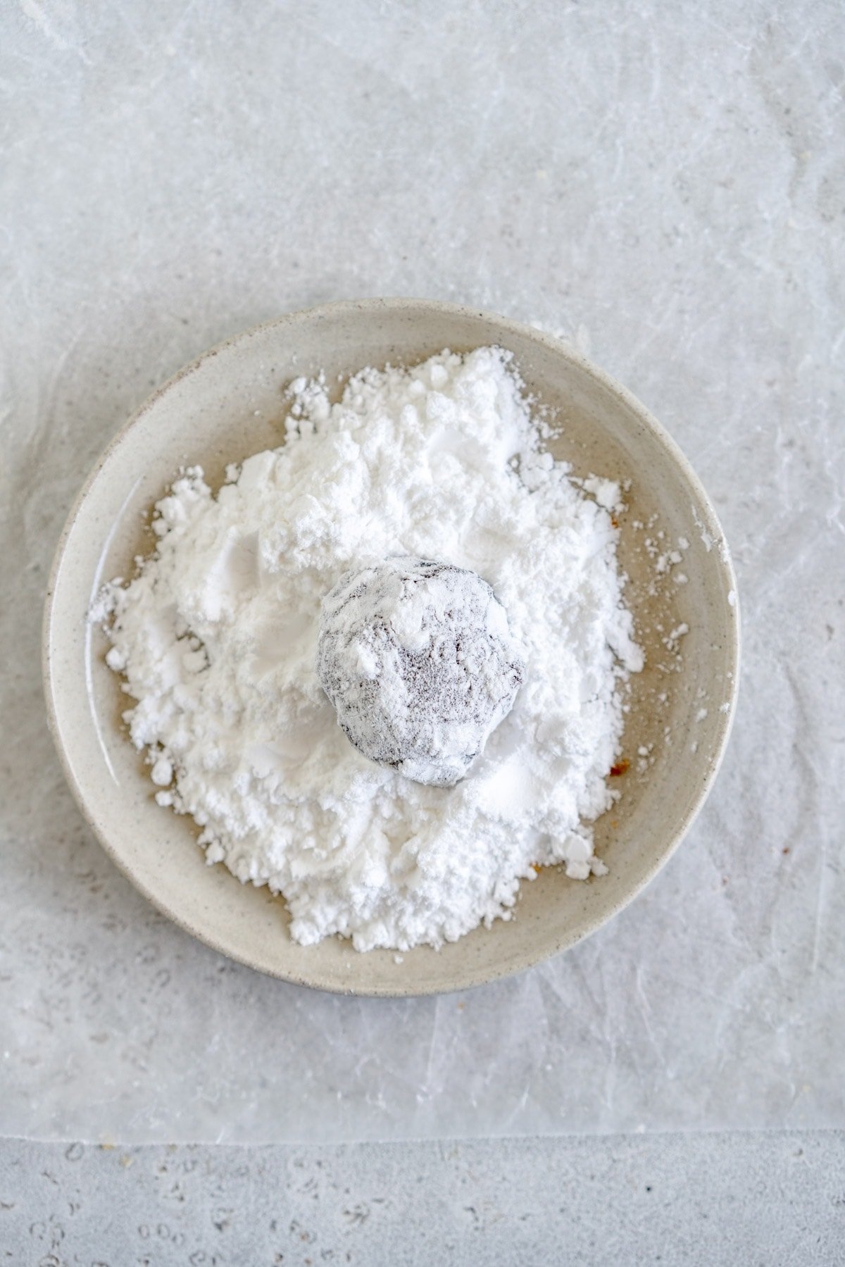 cookie dough rolled in powdered sugar