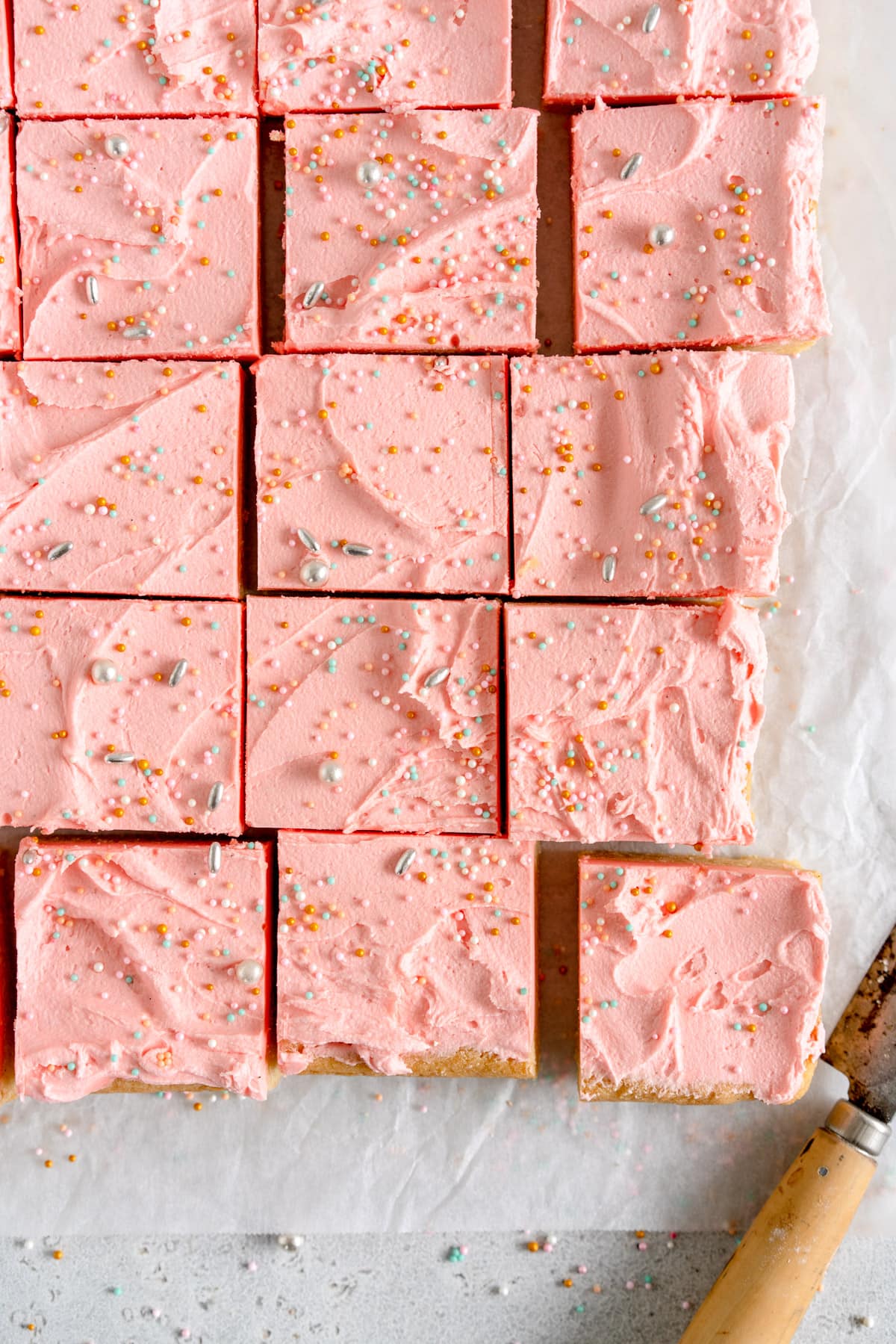 corner shot of frosted sugar cookies