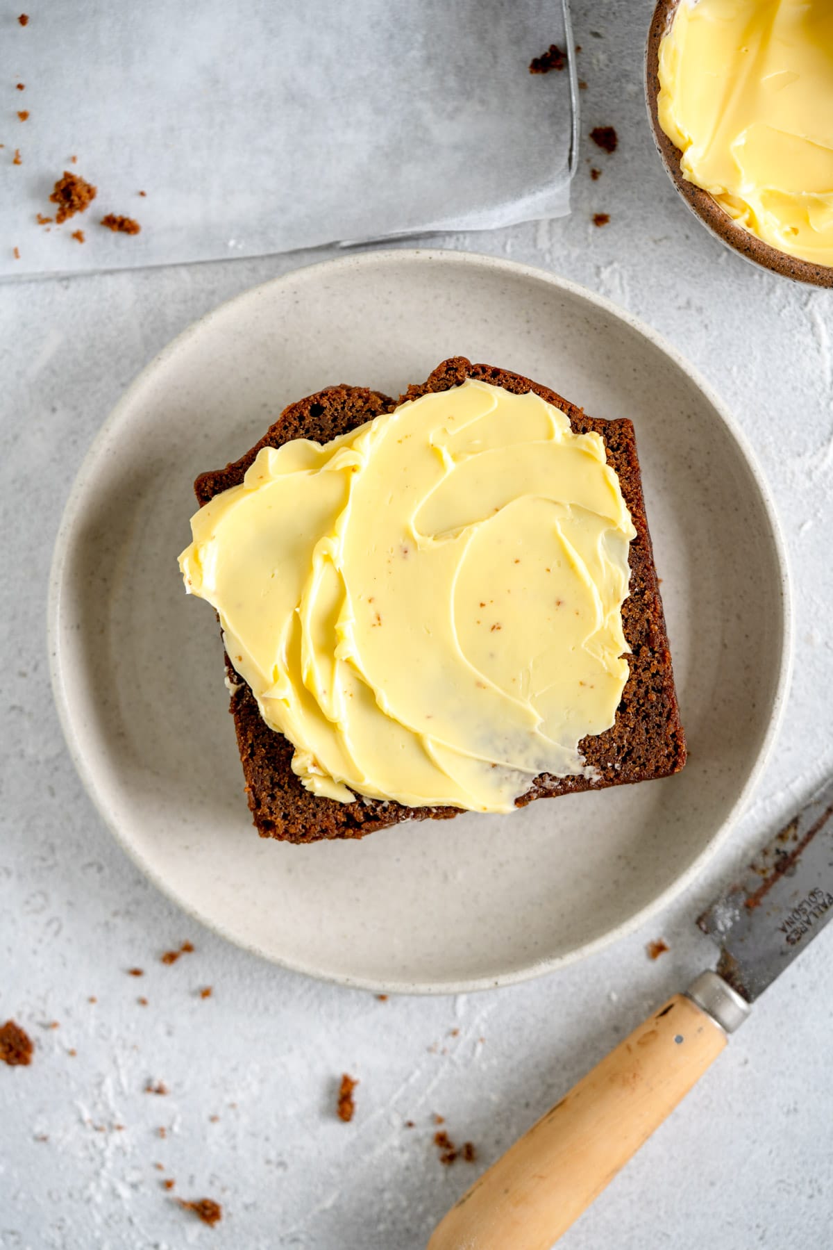 butter on gingerbread loaf