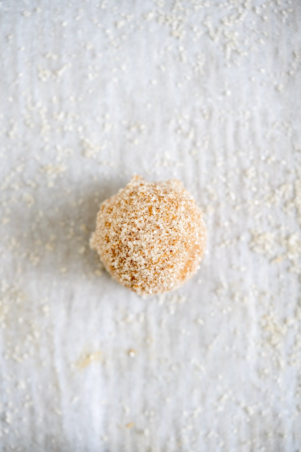 gingersnap dough rolled in suagr