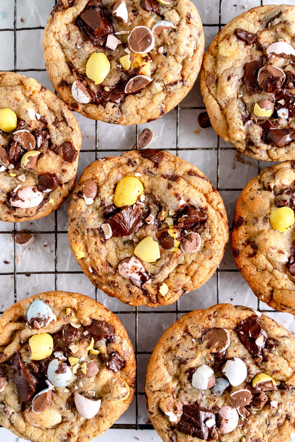 mini egg chocolate chip cookies on wire rack