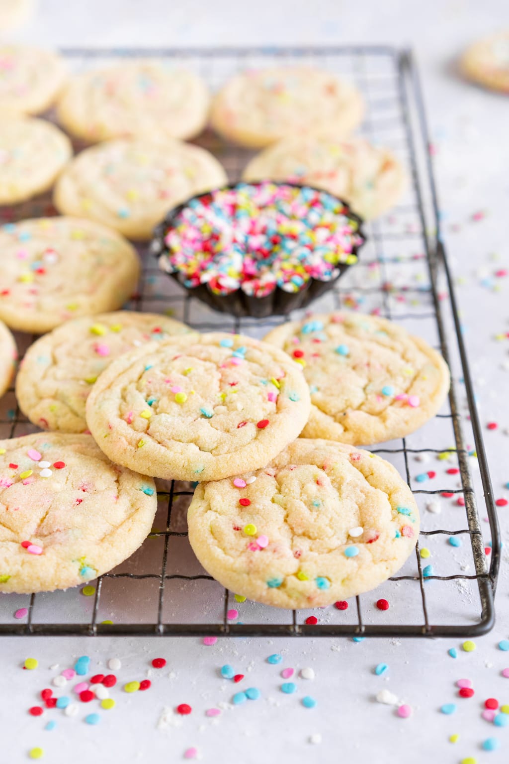 angle shot of stacked cookies on a wire rack