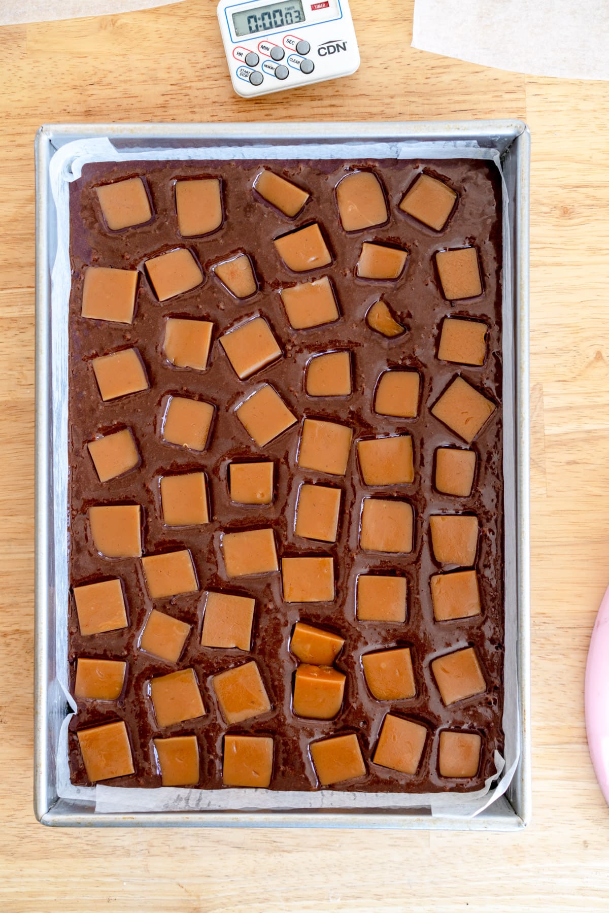 chunks of caramel on a brownie