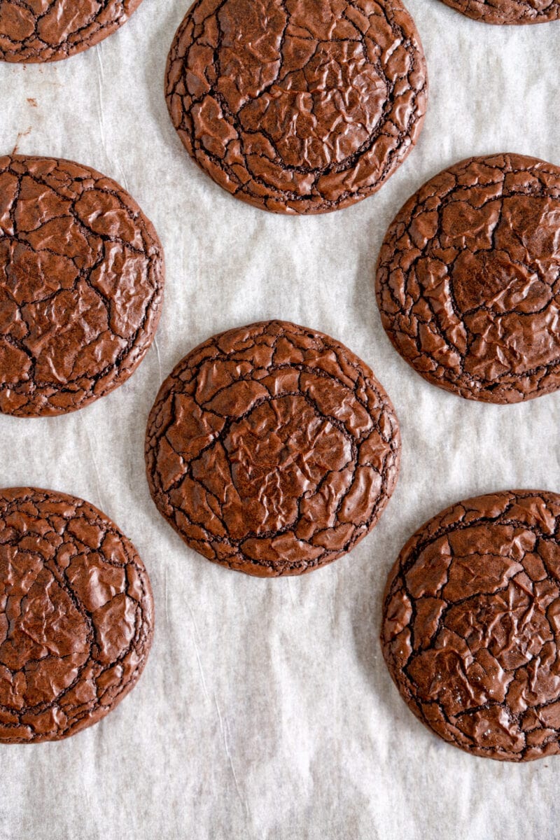 baked brownie cookies on parchment paper
