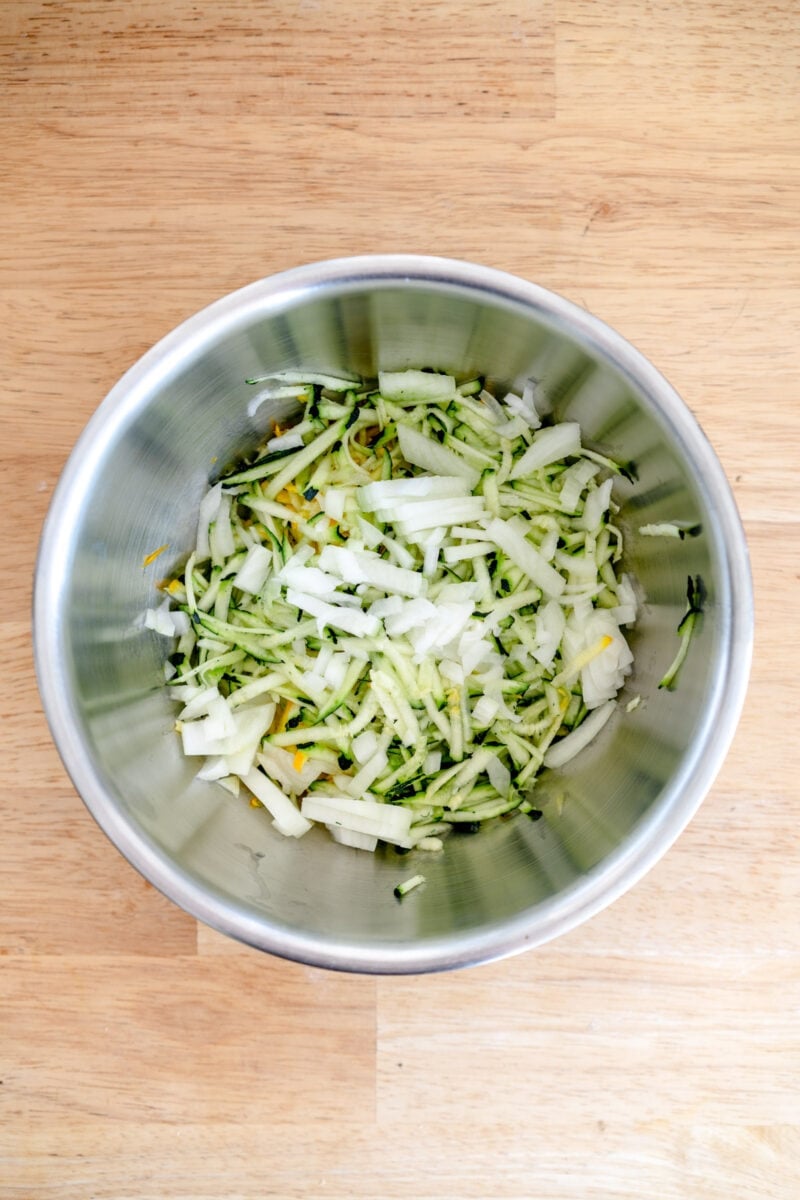 Zucchini and onion in a bowl