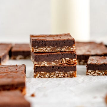 stacked up Anzac biscuit brownie bars