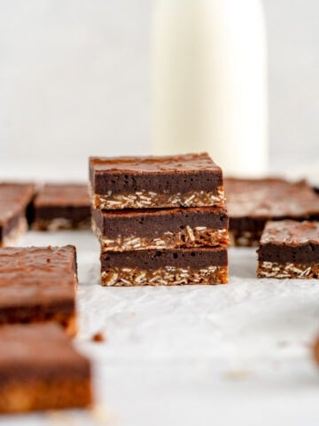 stacked up Anzac biscuit brownie bars