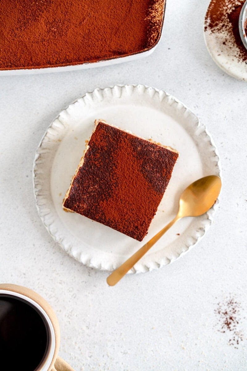 cut piece of tiramisu on plate