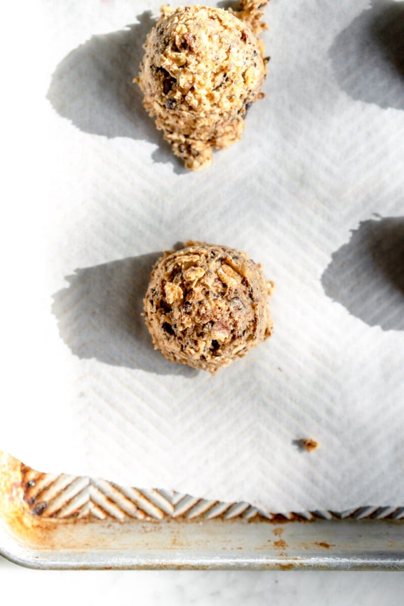 ball of cookie dough on parchment paper