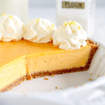 side shot of key lime pie with graham cracker crust