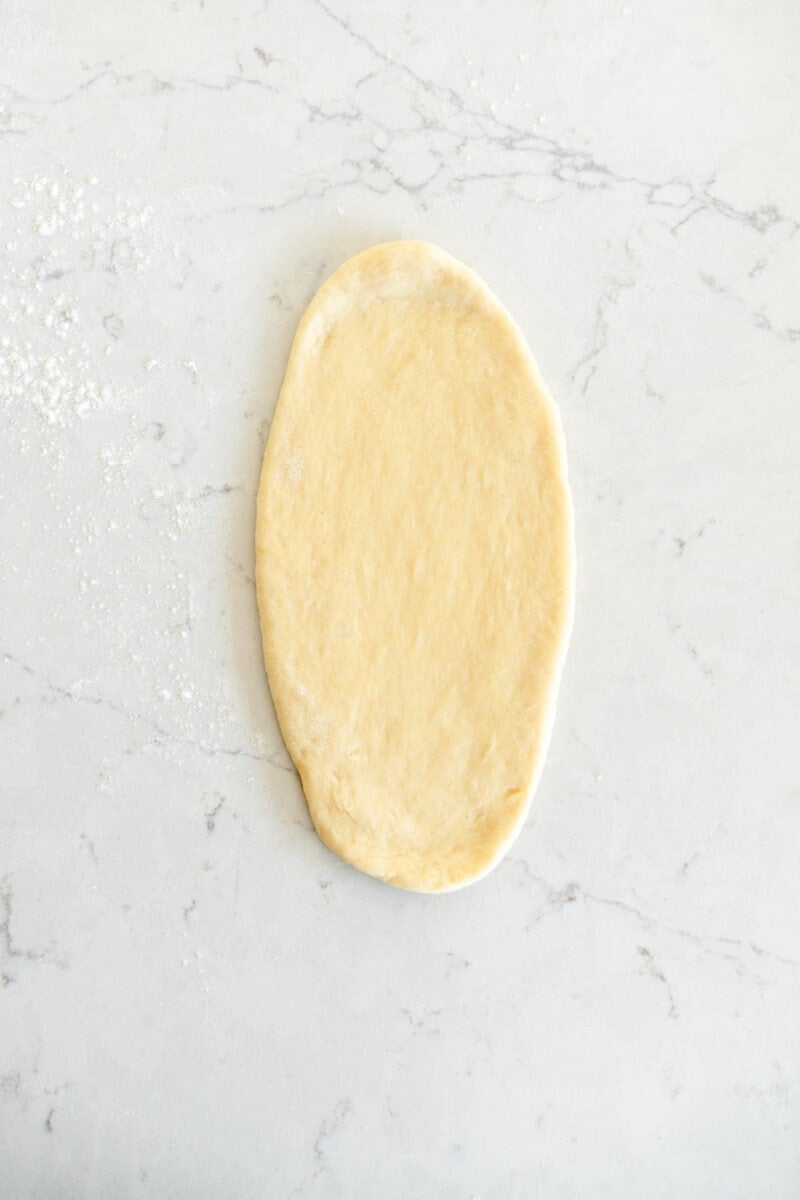 Rolled out dough ready to brush with butter