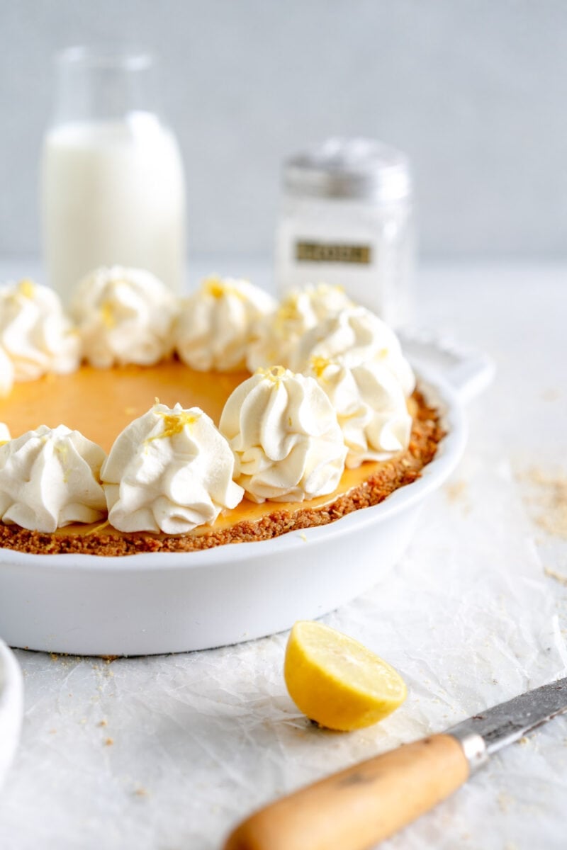 side shot of key lime pie with whipped cream