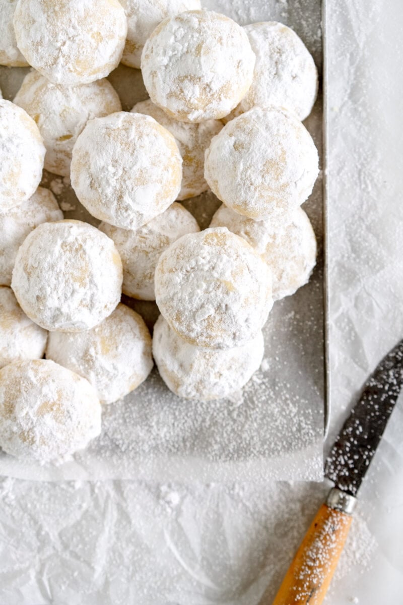 corner shot of pan of snowball cookies
