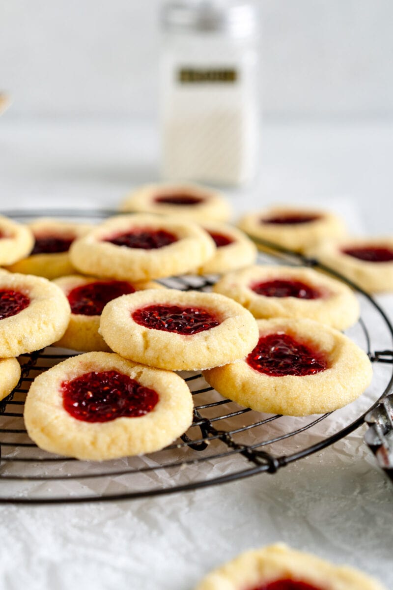 side on shot of baked thumbprint cookies